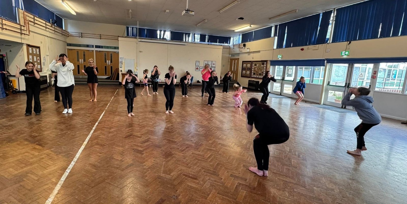 ASD Dance students in a full class session in the main studio